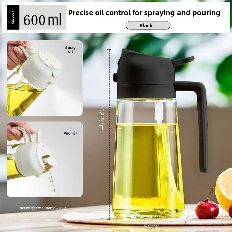 2-in-1 glass oil dispenser and sprayer next to plate of food